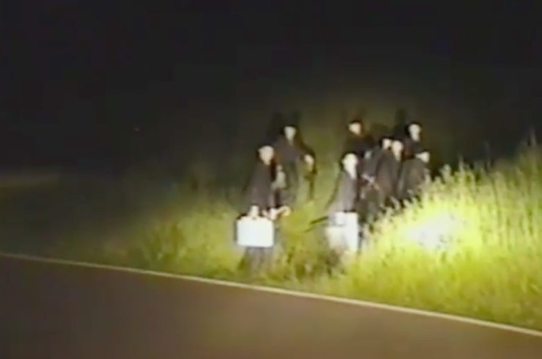 A road at dawn, strange Men with suits and a terrifying Video (debunked)