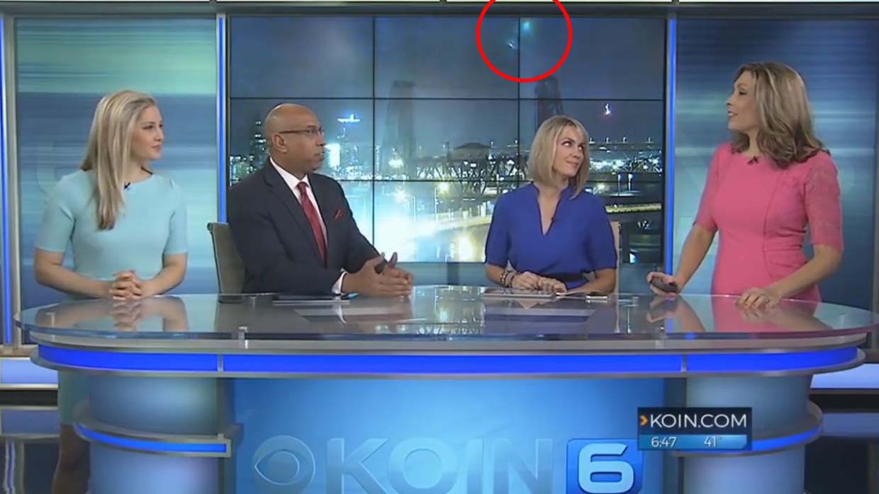 Two UFOs appear during a live broadcast on TV