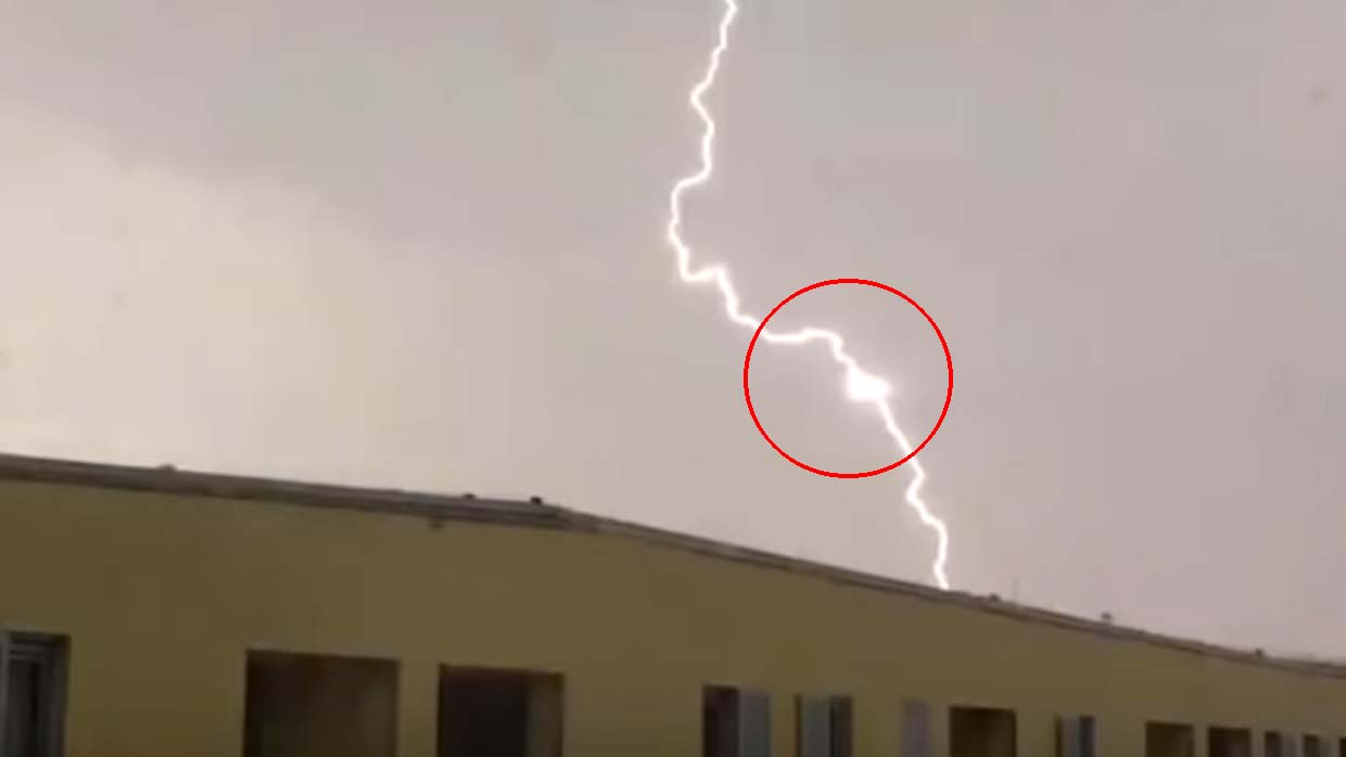 Photograph of a triangular UFO feeding the energy of lightning in the Czech Republic