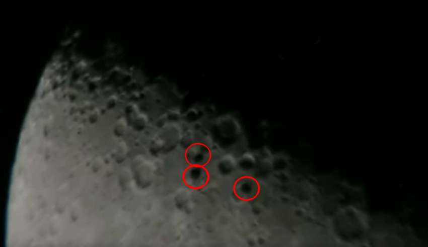 Astronomer captures three disk-shaped UFOs flying in formation in front of the Moon(UFO on moon)