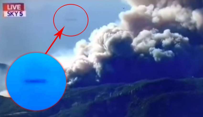 A cigar-shaped UFO bursts into the news broadcast on wildfires in California