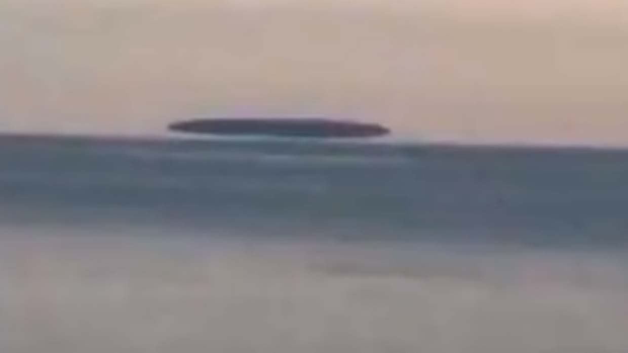 An enormous floating object appears on the Great Lakes, UFO, ghost ship or something else?