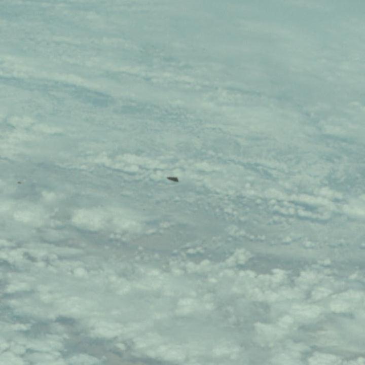 Triangular UFO appears in official NASA photographs  from the Apollo 9