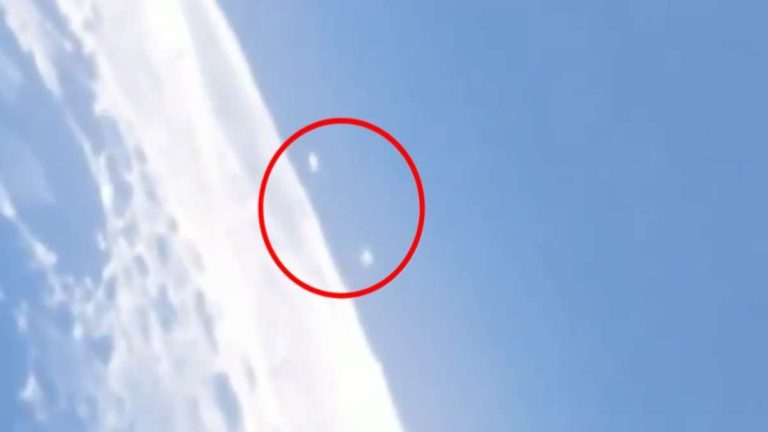 The video, shot in Canada, shows at least three light-colored oval objects, which as they pass across the lunar surface, cast their shadow.
