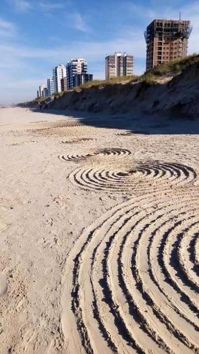 Mysterious circles appear in the sand of a Brazilian beach after several UFO sightings