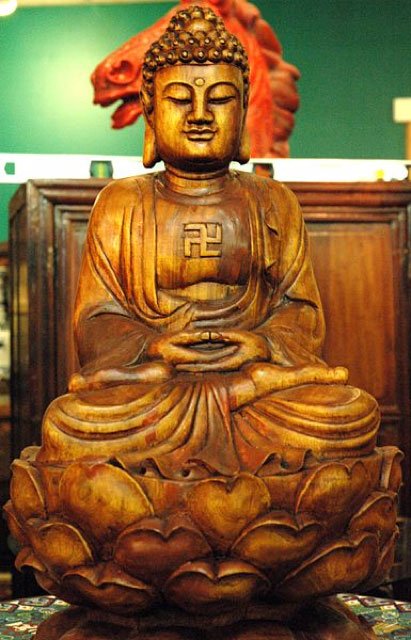 Swastika: The 12,000 Years old History of one of the most powerful symbol 5 Wooden Buddha