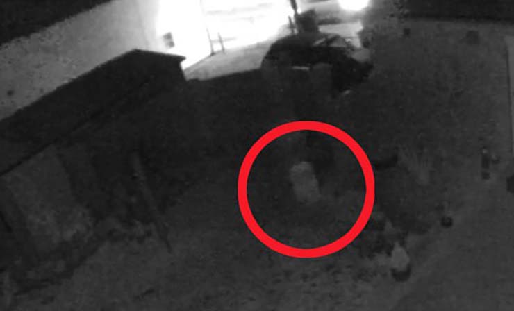 Security camera records a ghost of a child running through the garden of a house in England
