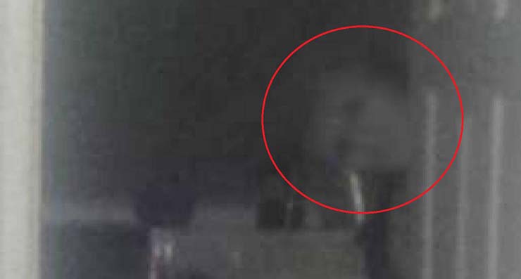 A man runs away from home after hearing strange noises and photographing a ghost staring at him