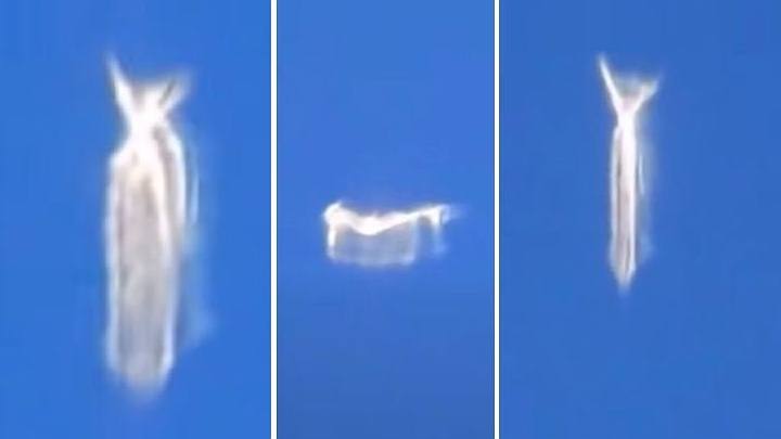 Airplane Passenger Filmed An Unusual Shape Shifting UFO Or A Mysterious Creature?