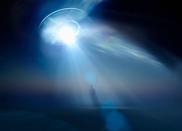 An illustration of a UFO emitting a beam of light.